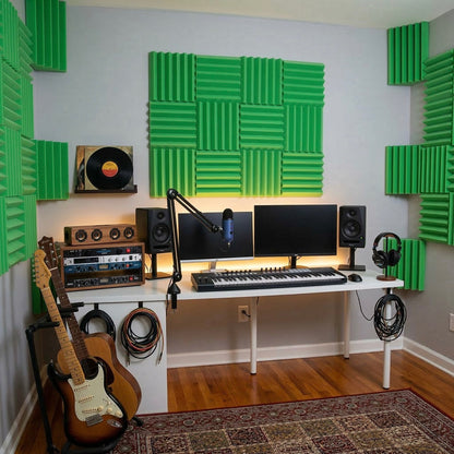 Home studio setup with green acoustic panels on the wall