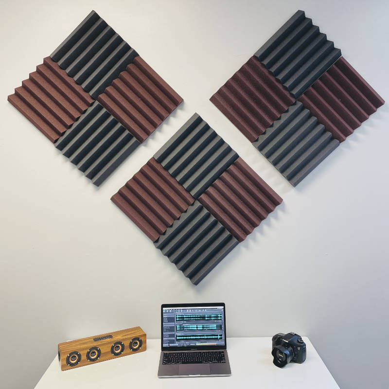 office setup with maroon and charcoal acoustic foam wall panels