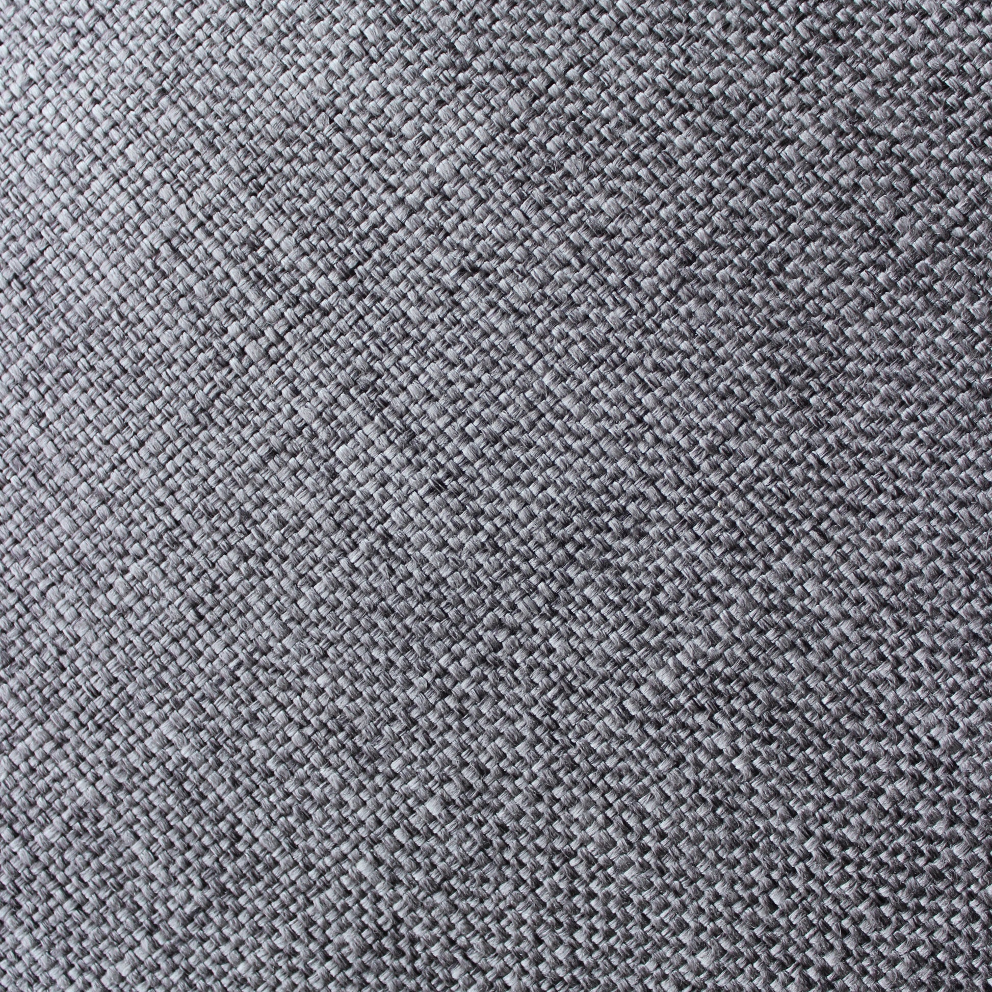 charcoal gray fabric textured close up on owens corning acoustic panel