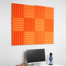 Load image into Gallery viewer, office setup with orange wedge acoustic foam wall tiles
