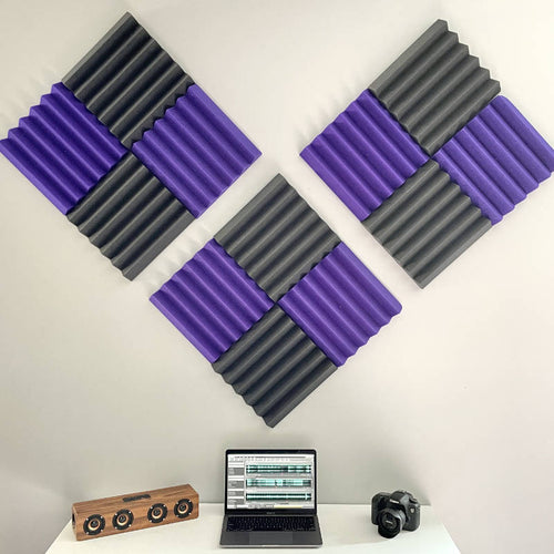 office setup with purple and black wedge acoustic foam panels